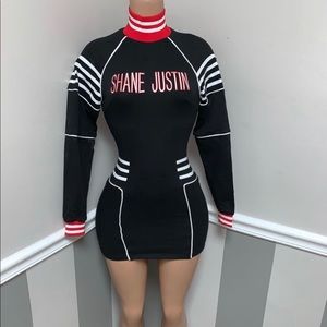 A black dress with red & white detailing